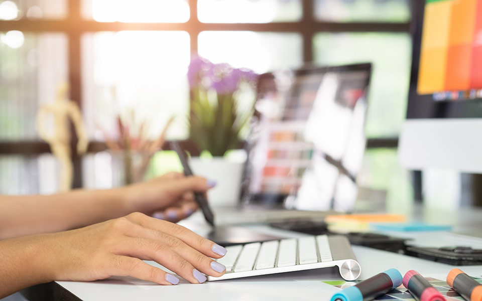 image of woman designing logo