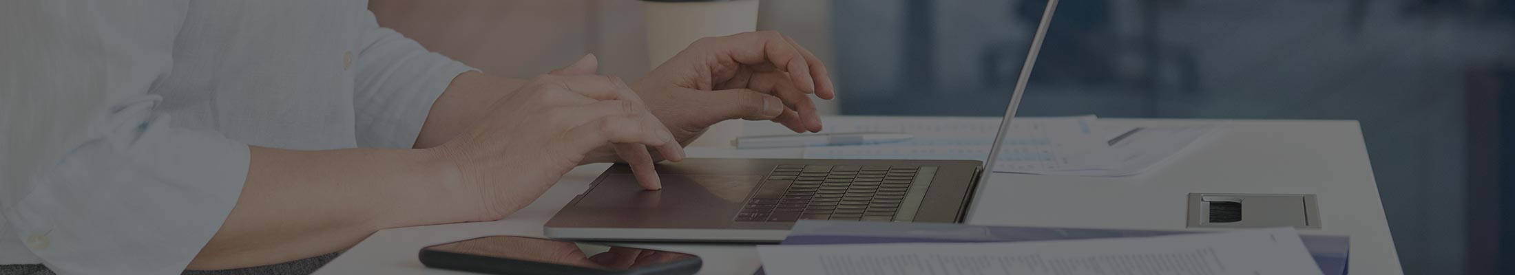 image of woman using laptop for work